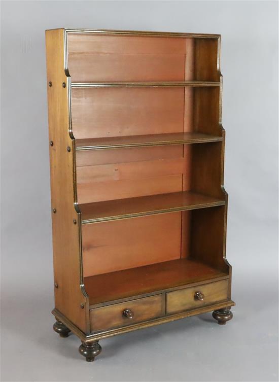 A Victorian mahogany waterfall bookcase, W.2ft 5in. D.1ft 1in. H.4ft 2in.